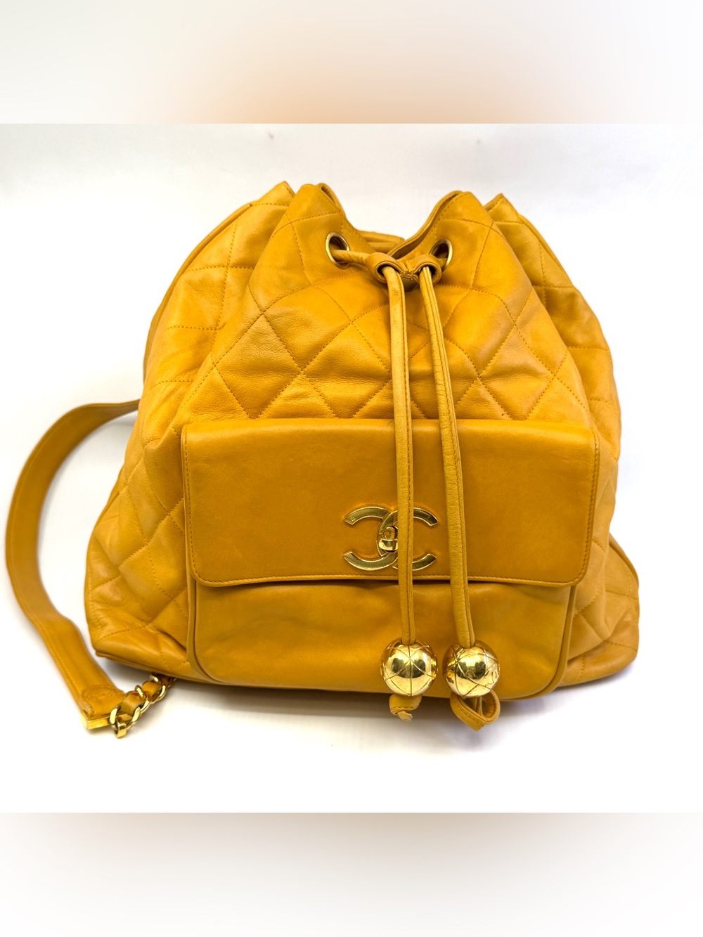 Authentic Chanel Drawstring Backpack, Yellow color Quilted Leather